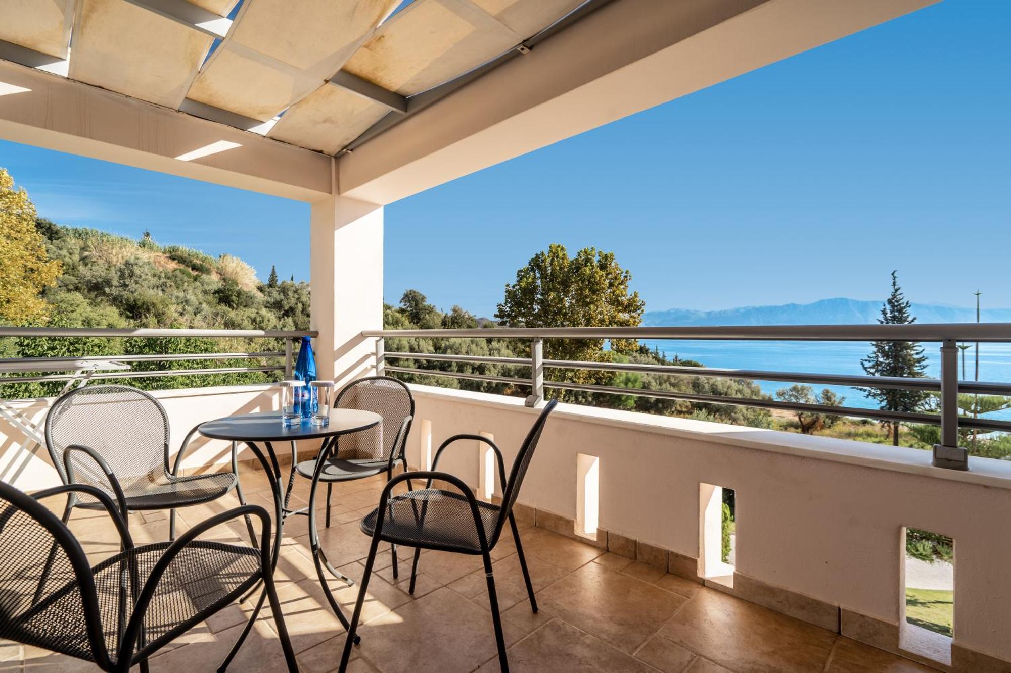 Porto Galini Seaside Resort & Spa Nikiana Ngoại thất bức ảnh A balcony in Greece