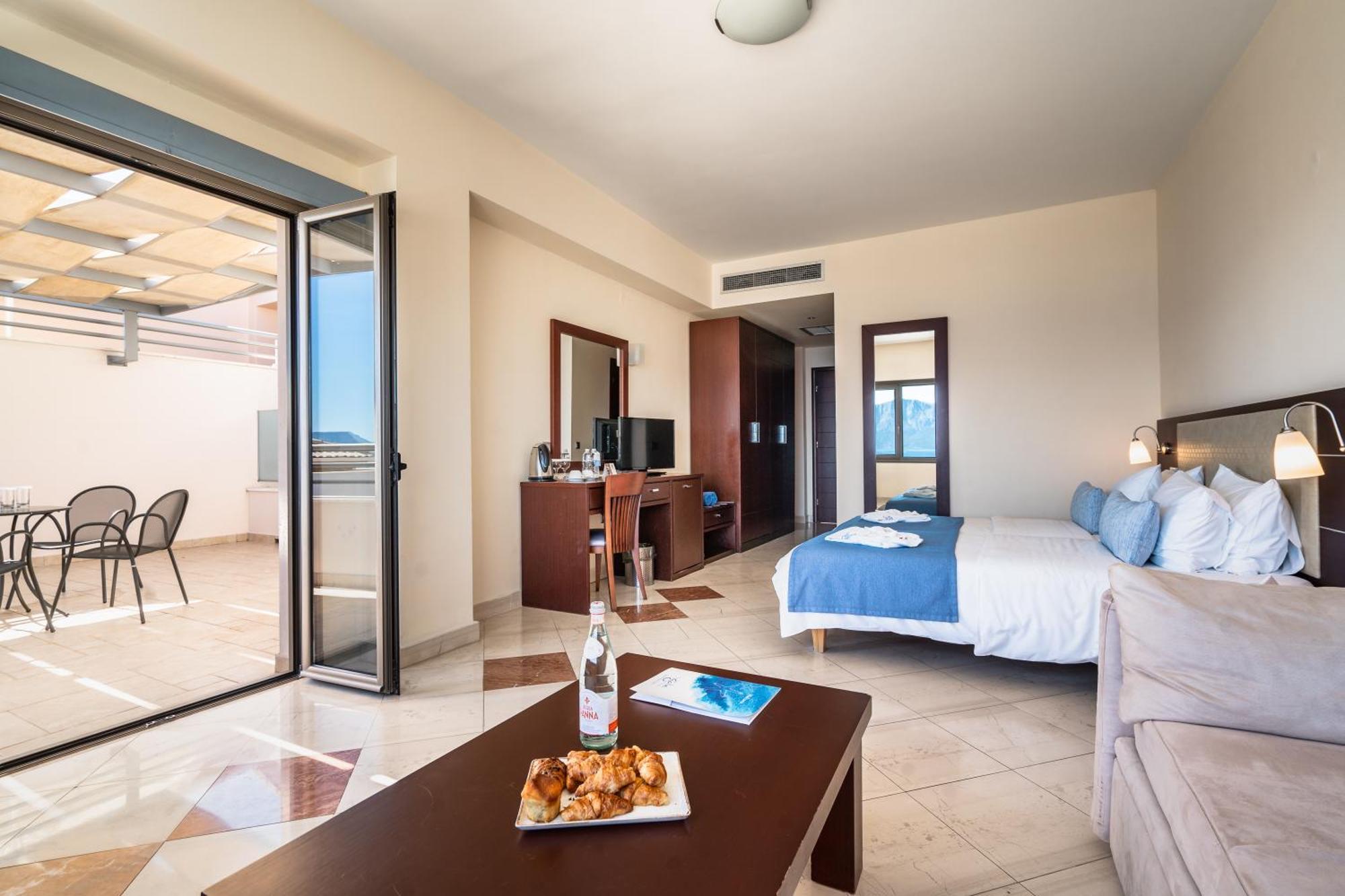 Porto Galini Seaside Resort & Spa Nikiana Ngoại thất bức ảnh A typical hotel room